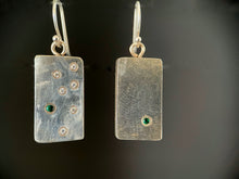 Load image into Gallery viewer, Polished rectangular silver earrings. The one on the left has a single emerald in the lower right. The earring on the right has a scattering of 6 moissanite with a single emerald.
