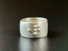 Load image into Gallery viewer, A sterling silver ring reading &quot;question&quot; in accurate, functional, grade 2 braille.
